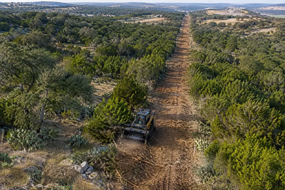 Commercial land clearing San Antonio: aerial view of a survey line cut through cedar, mesquite and prickly pear outside Loop 1604