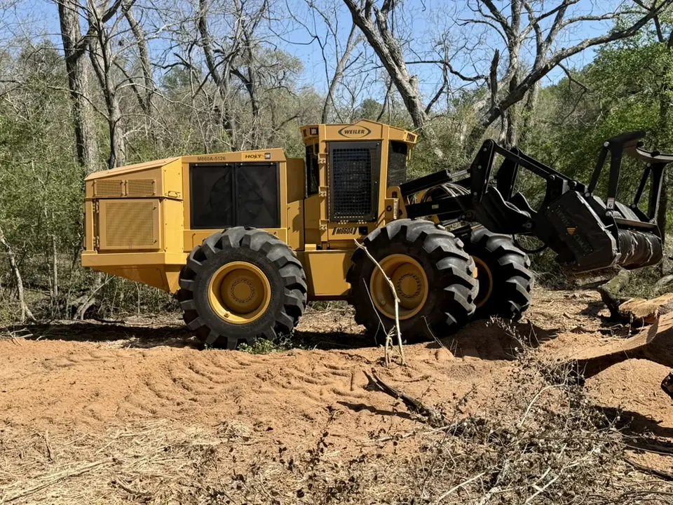Piney woods land clearing: 9 Arrow articulated mulcher clearing a wooded lot