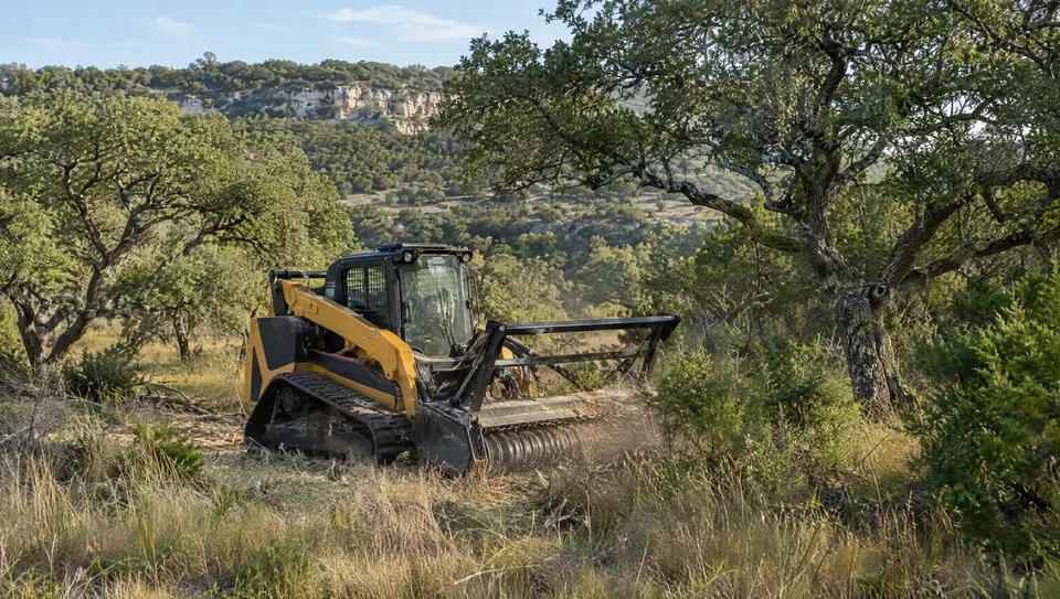Forestry mulching in Bulverde, TX: compact track mulcher among live oak clusters in a Bulverde valley